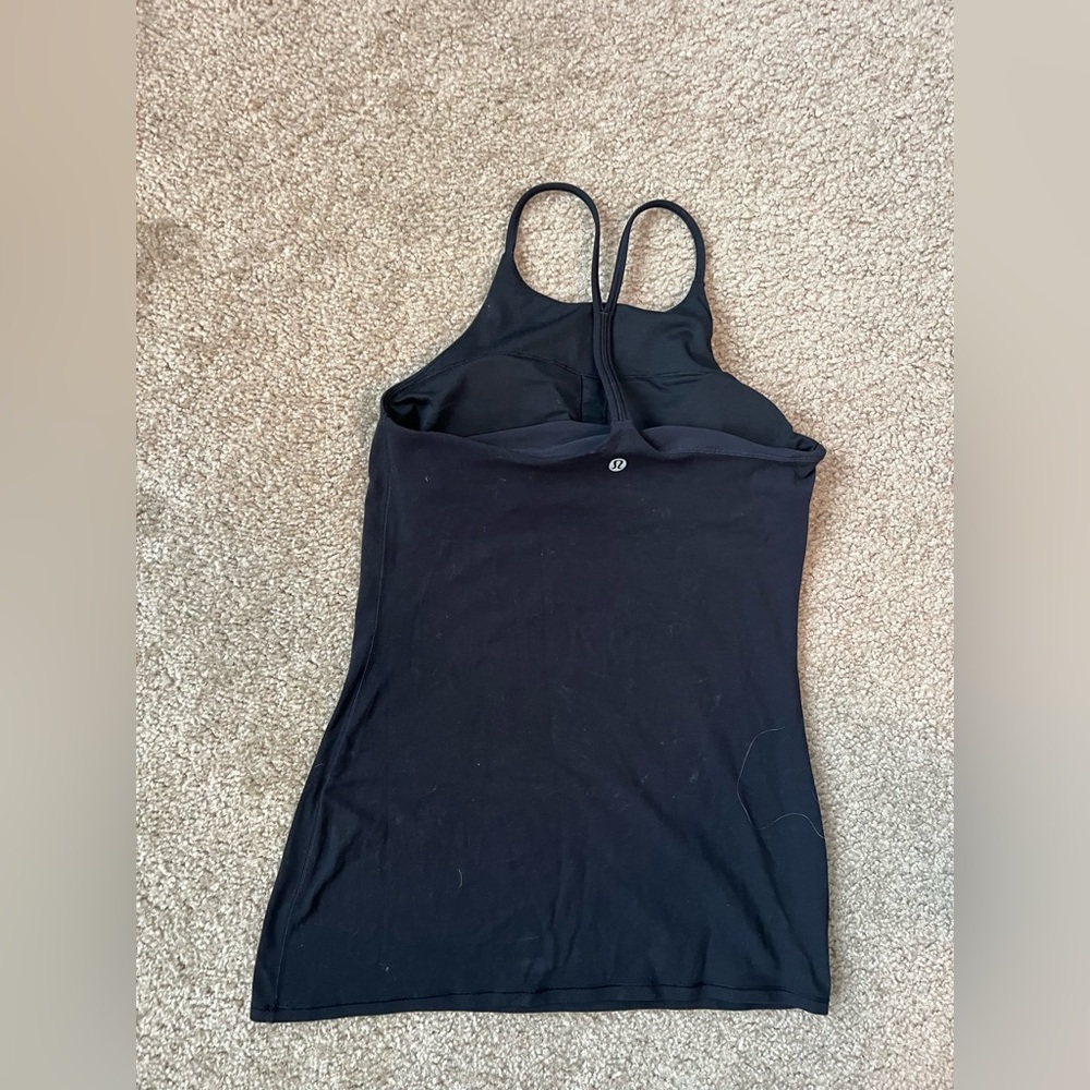 Lululemon size small workout tank with lined built in bra.